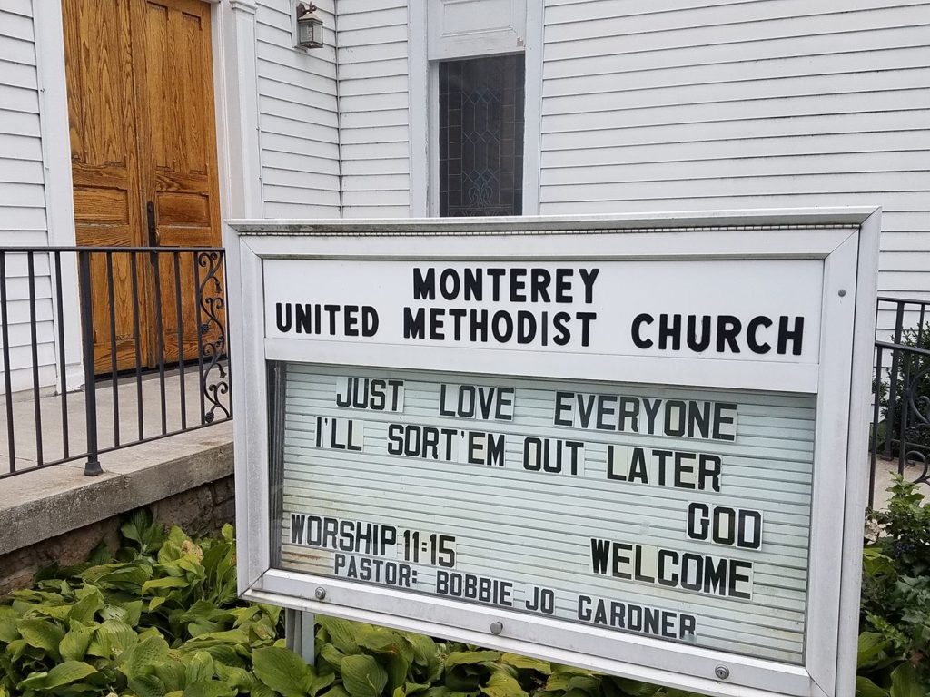 Sign outside Methodist church reads, "Just love everyone. I'll sort 'em out later. God" 