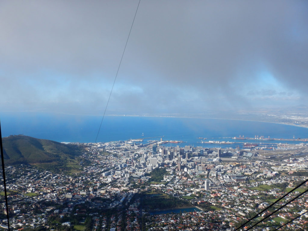 At the top, a cloud. At the bottom, the city of Cape Town. In the distance, Table Bay, which opens into the Atlantic Ocean.