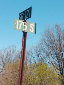 Signpost indicating the intersection of SR 121 and CR 175S